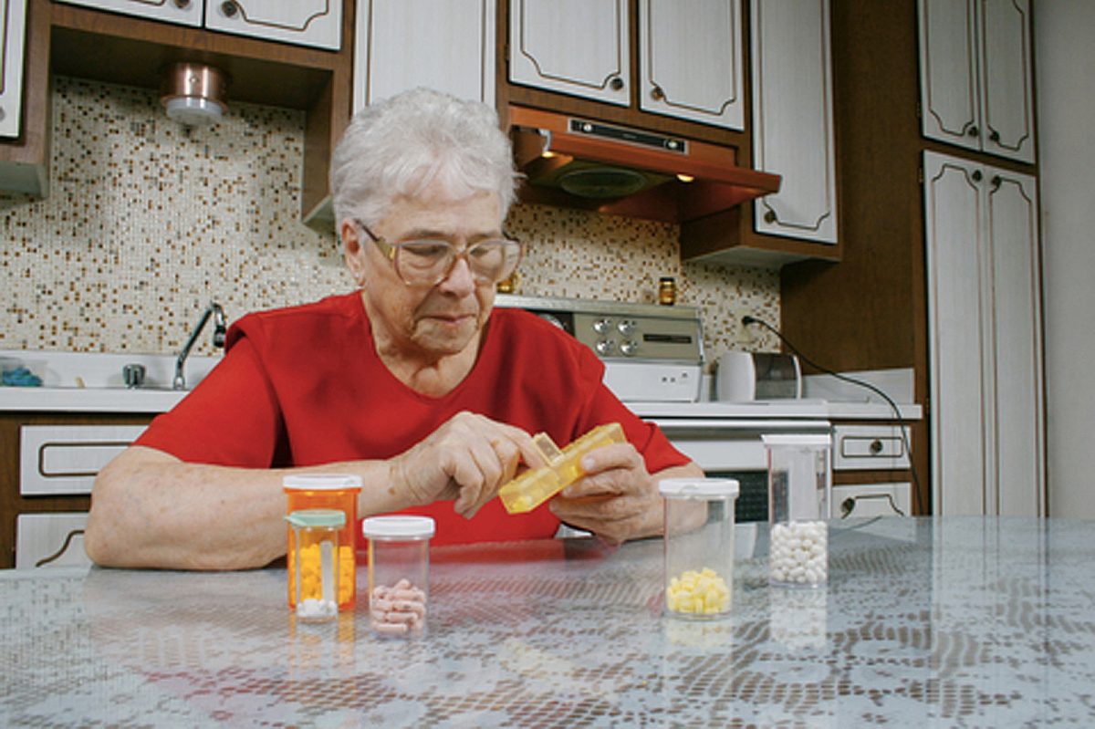 Woman with medications WEB RGB